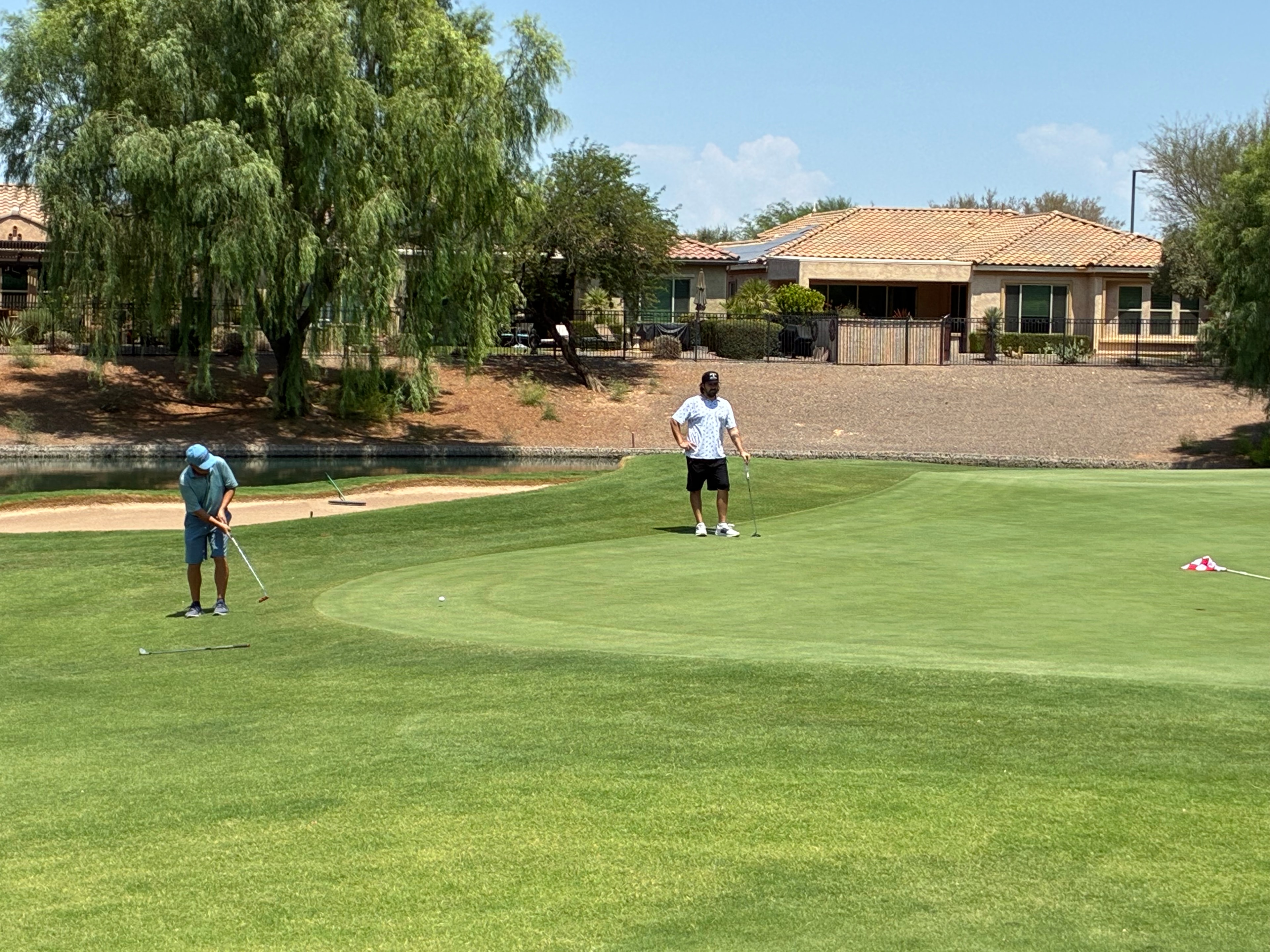 Brad Pilon chipping on the first playoff hole at Copper Canyon Golf Club